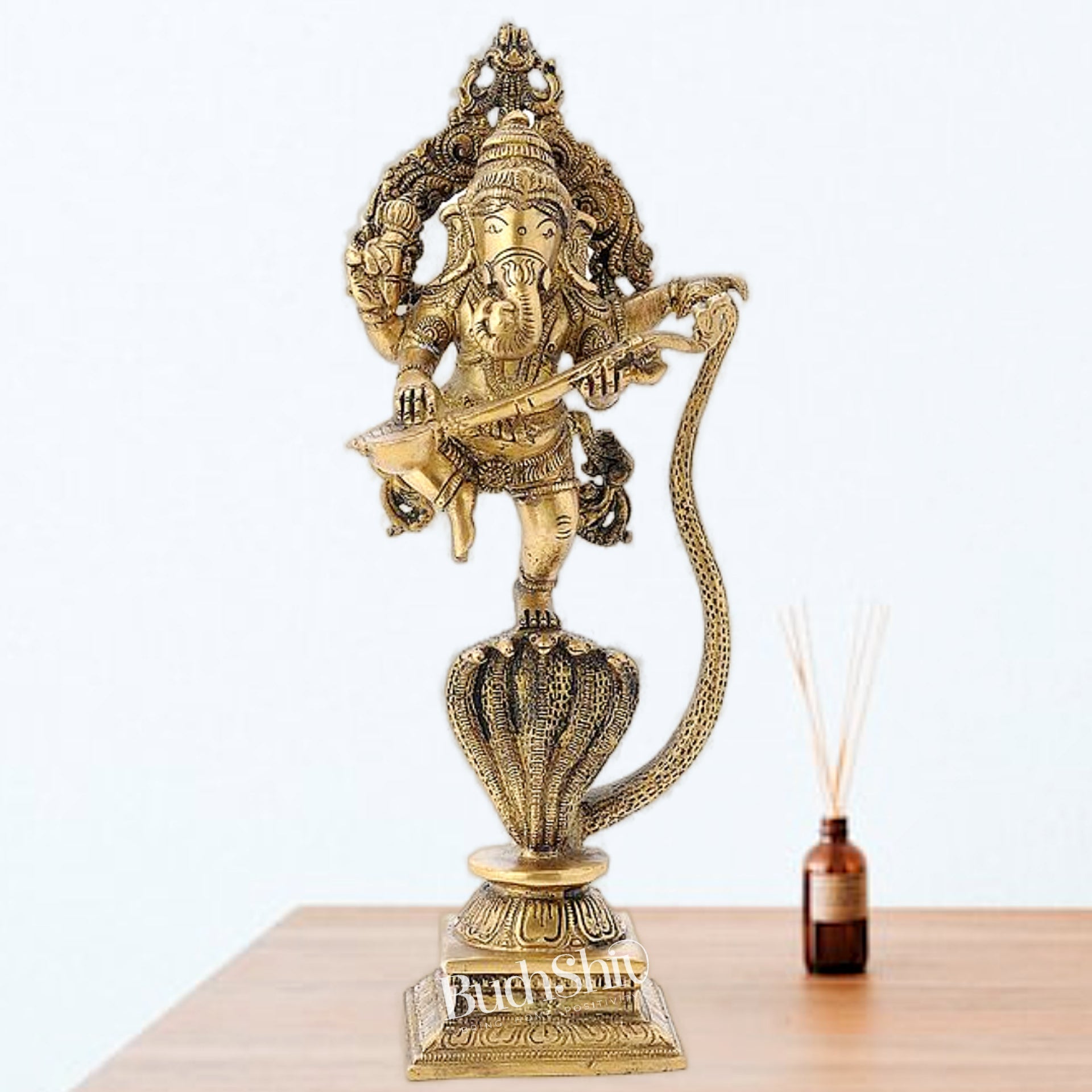 Brass Dancing Ganesha Playing Veena on Kalinga Naag Statue 10" - Budhshiv.com