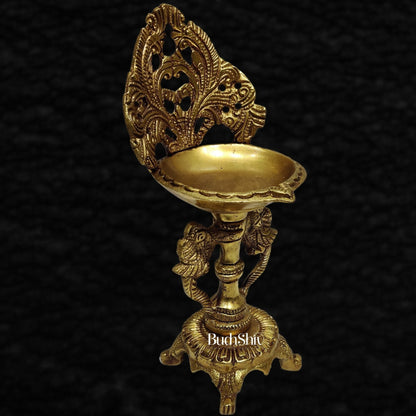 Brass engraved diya with a stand peacock and floral design 9 inch - Budhshiv.com