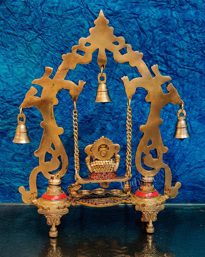 Brass Ganesha Swing with Three Diyas - Handcrafted Beauty - Budhshiv.com