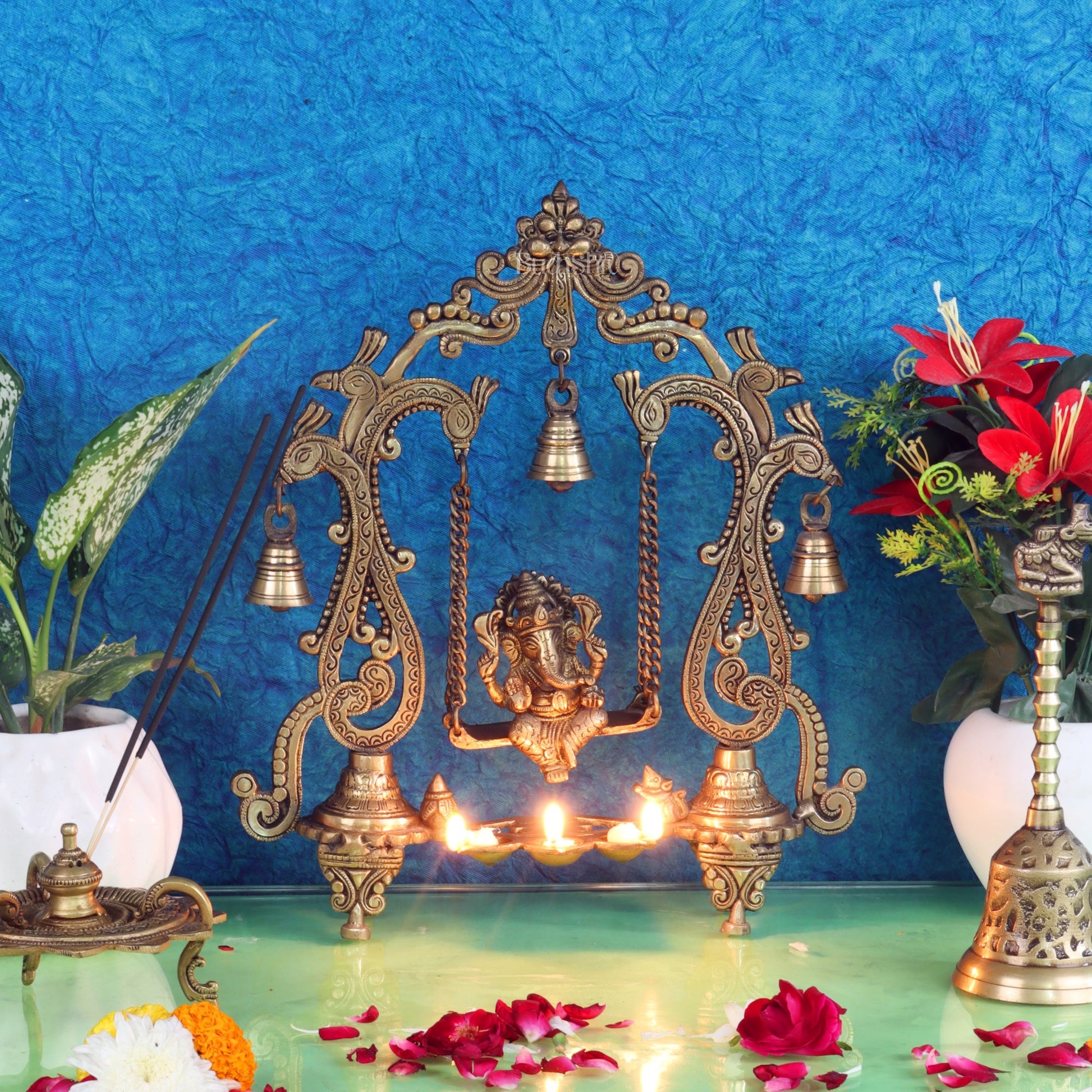 Brass Ganesha Swing with Three Diyas - Handcrafted Perfection - Budhshiv.com
