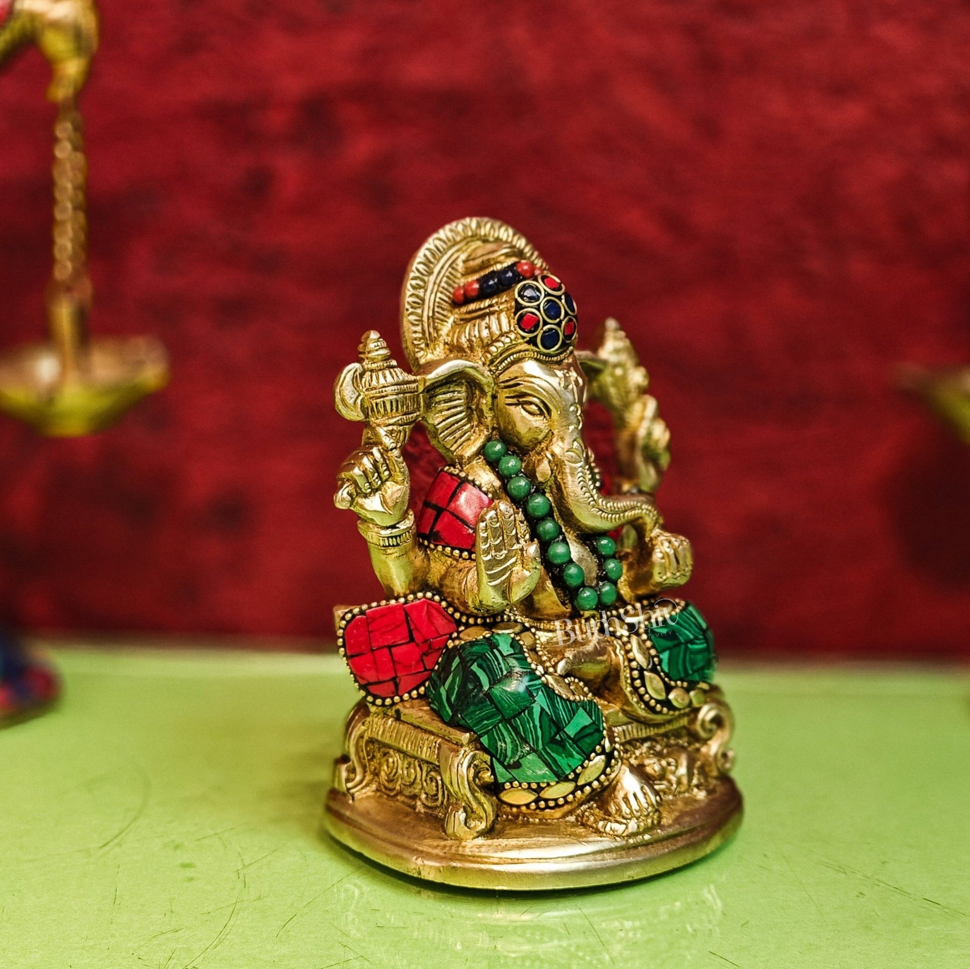 Brass Handcrafted Ganesha Idol Seated on Chair with Natural Stones 5.5" - Budhshiv.com