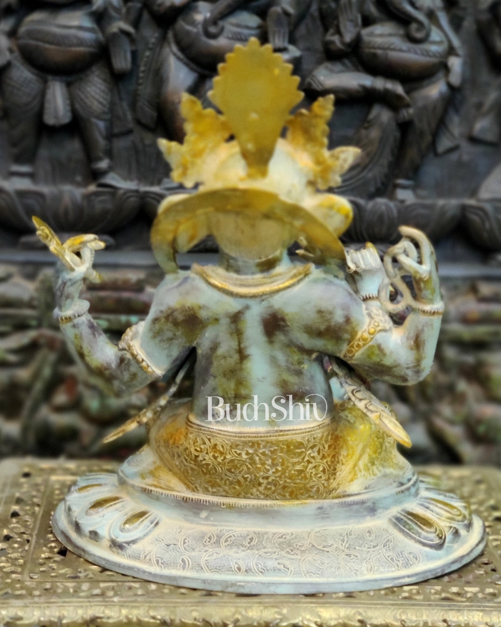 Brass Nepalese Style Ganesha seated on a round base. - Budhshiv.com