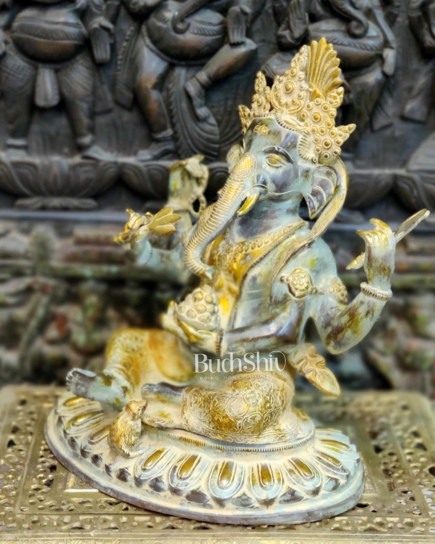 Brass Nepalese Style Ganesha seated on a round base. - Budhshiv.com