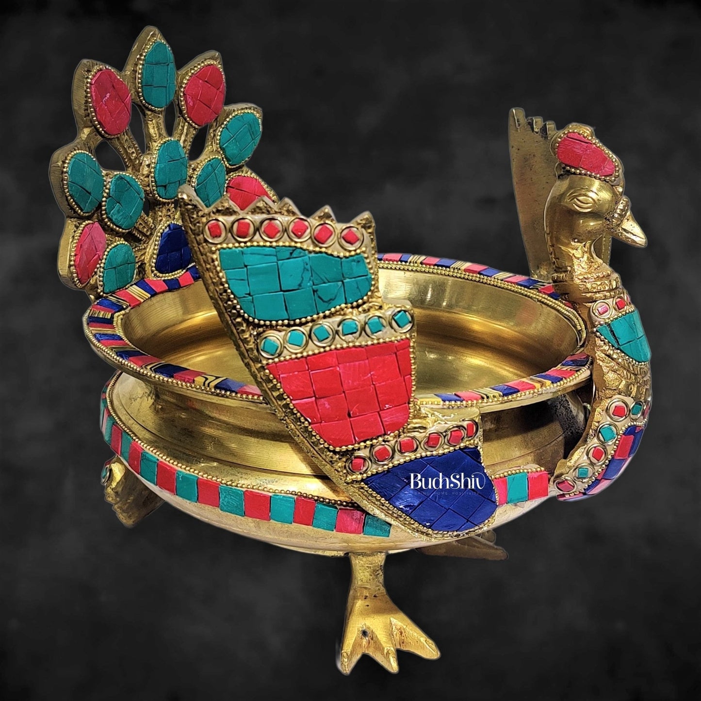 Brass peacock shaped urli with stonework - Budhshiv.com