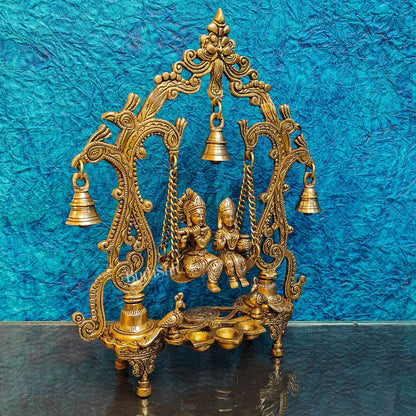 Brass Radha Krishna Swing with Three Diyas 13.5 inch - Budhshiv.com
