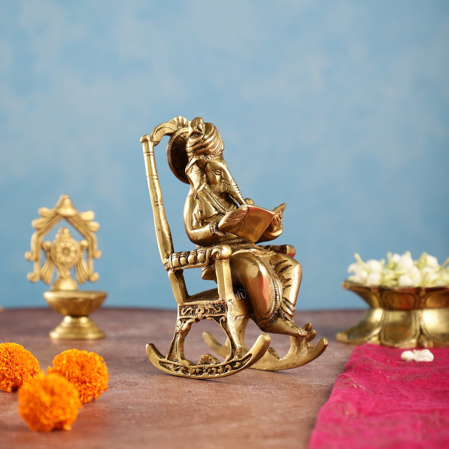 Brass superfine Ganesha on rocking chair 7" - Budhshiv.com