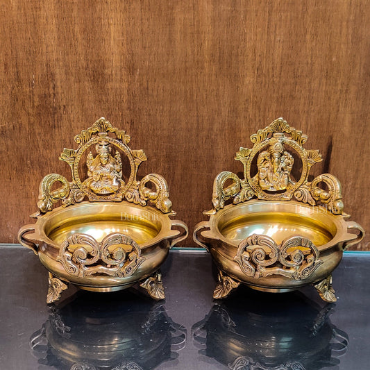 Divine Pair: Lord Ganesha and Goddess Lakshmi Brass Statues on Decorative Urli - Budhshiv.com