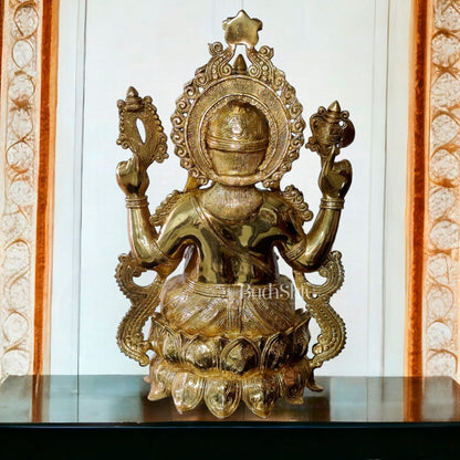 Ganesha Brass Idol 21 inches high seated on a lotus base lacquer coated - Budhshiv.com