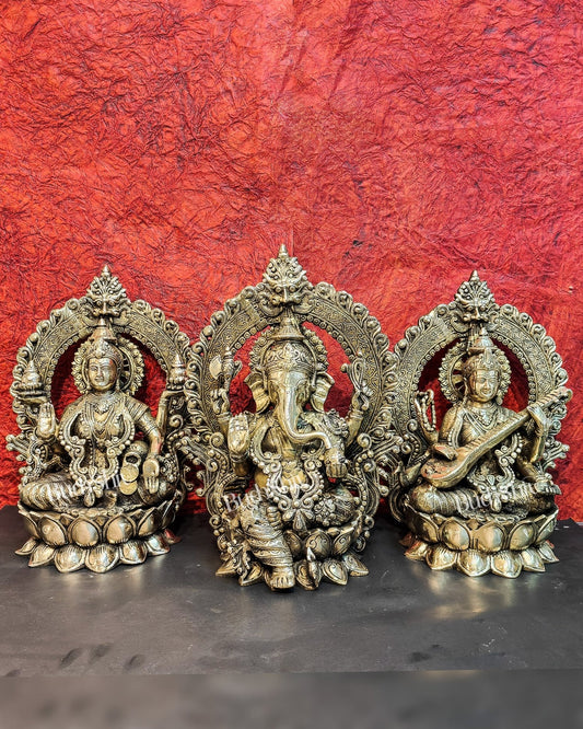 Handcrafted Brass Ganesha Lakshmi Saraswati Idols with Prabhavali 15 inch - Budhshiv.com