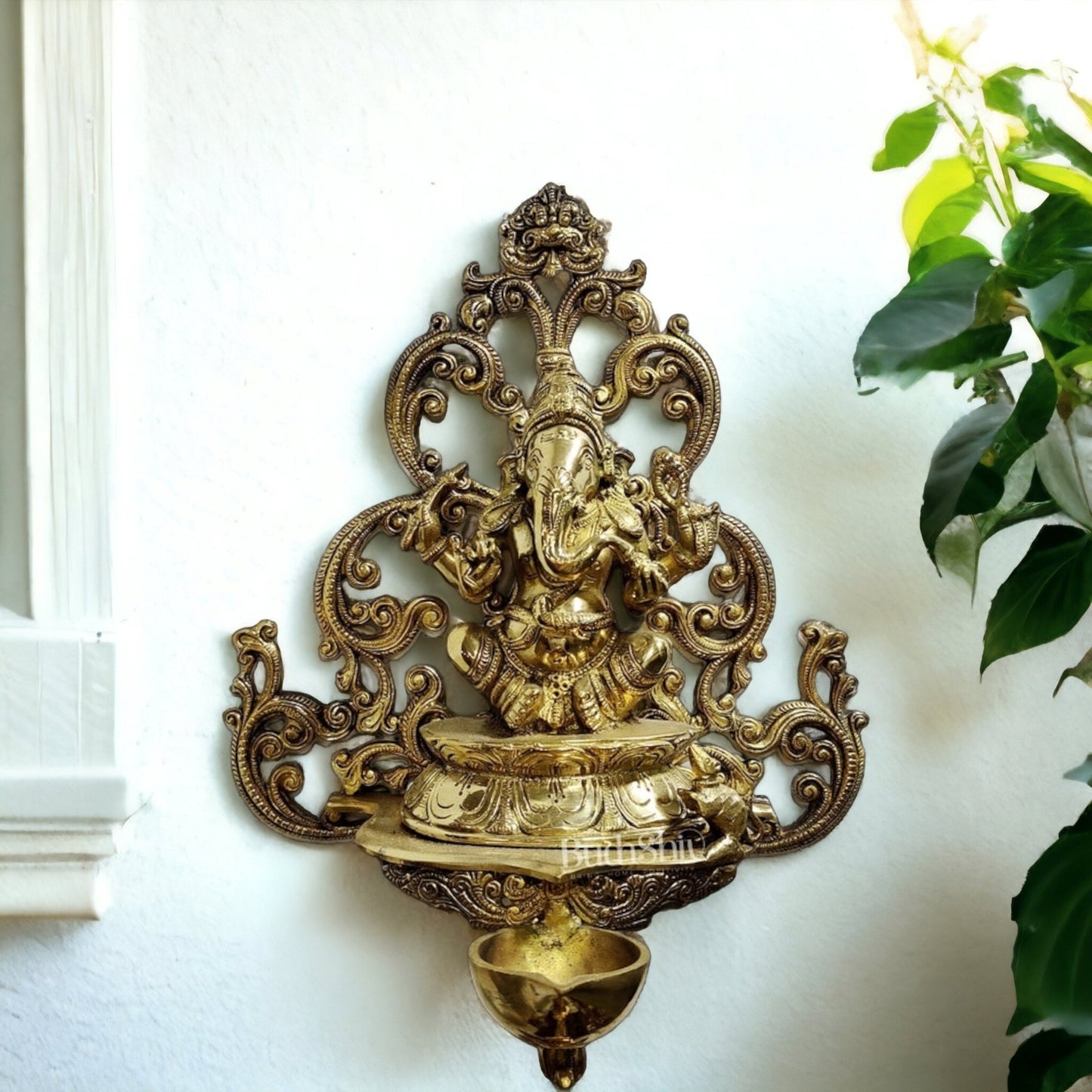 Handcrafted Lord Ganesha Wall Hanging Statue with Floral Design Frame | Diya Included - Budhshiv.com