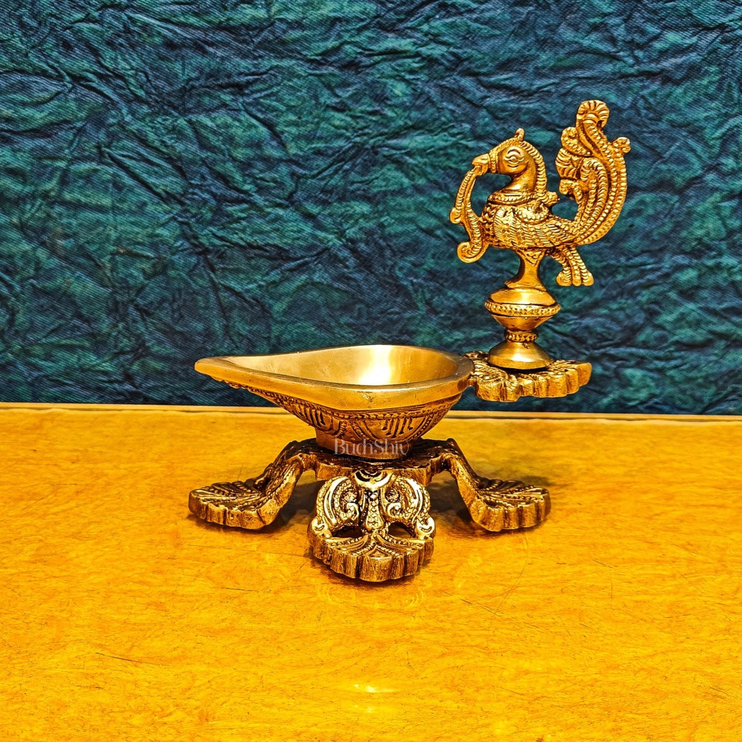 Peacock / annam design brass diya with 4 legged stand - Budhshiv.com