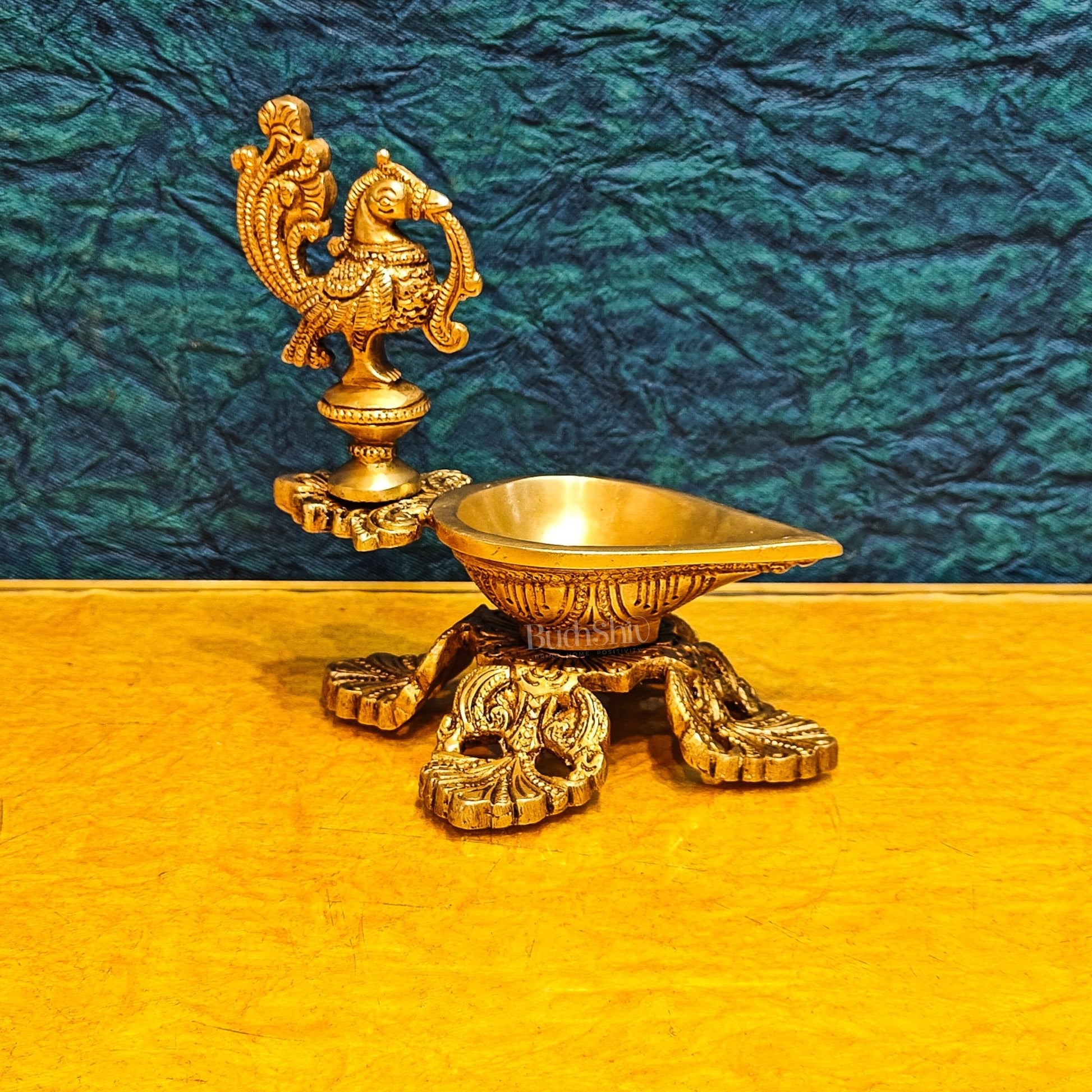 Peacock / annam design brass diya with 4 legged stand - Budhshiv.com