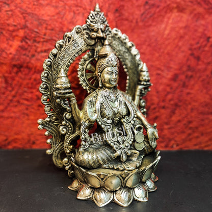 Pure Brass Handcrafted Lakshmi Idol on Lotus Base with Prabhavali Frame | 15.5" - Budhshiv.com