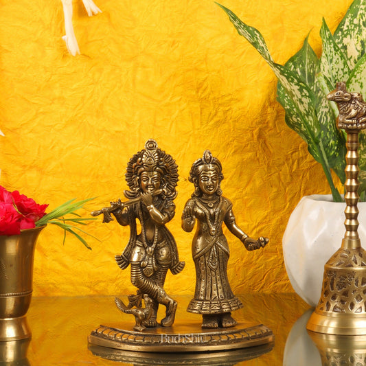 Radha with Krishna playing the flute with a peacock 7 inches Antique finish - Budhshiv.com