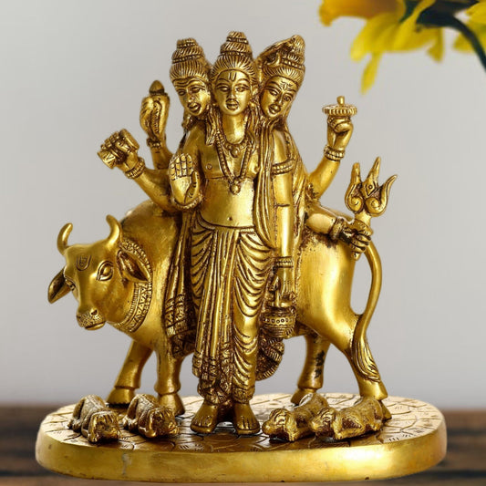 Three faced Dattatreya guru with a cow and four dogs. - Budhshiv.com